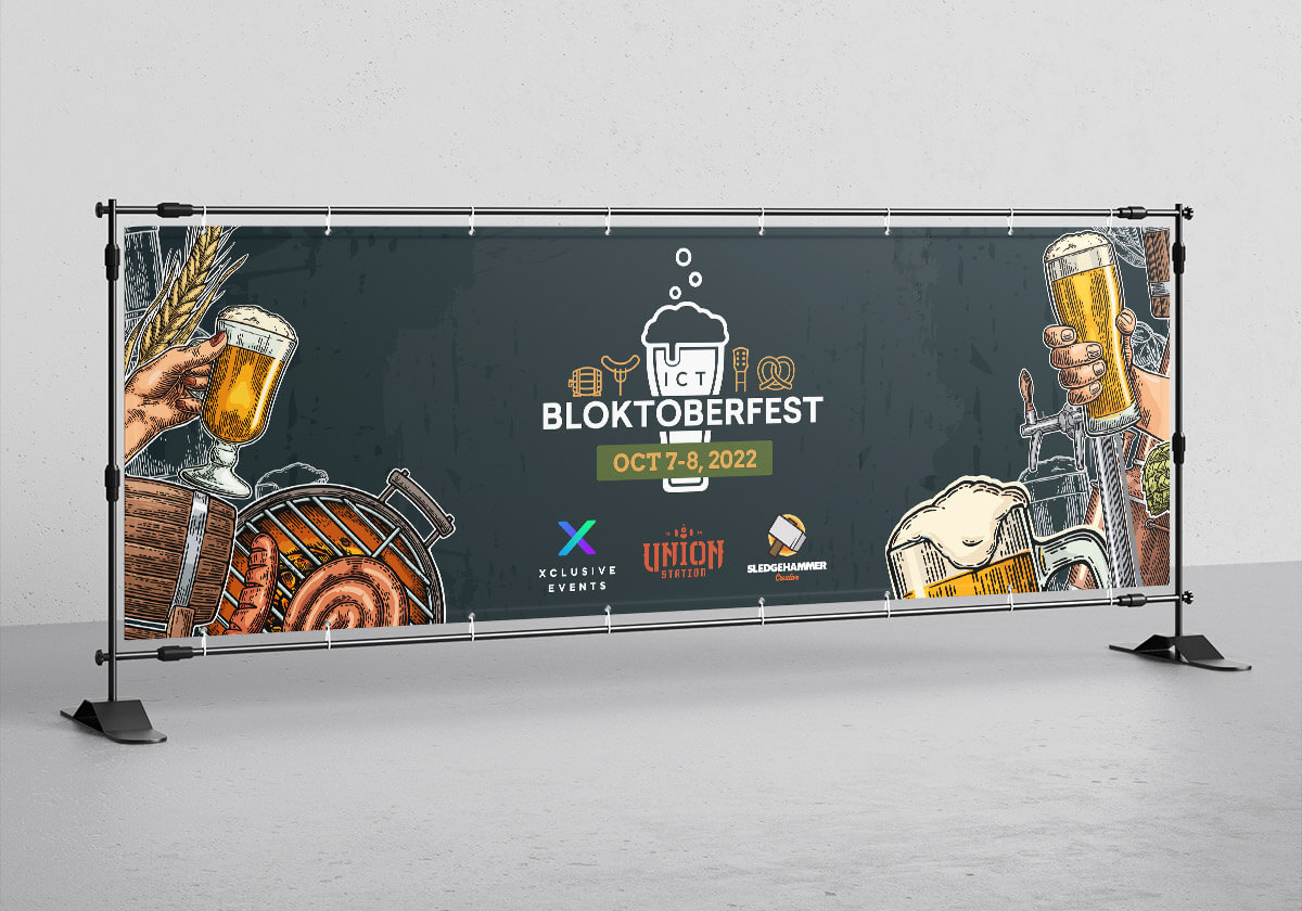 Horizontal standing banner with Bloktoberfest logo and line art graphics.