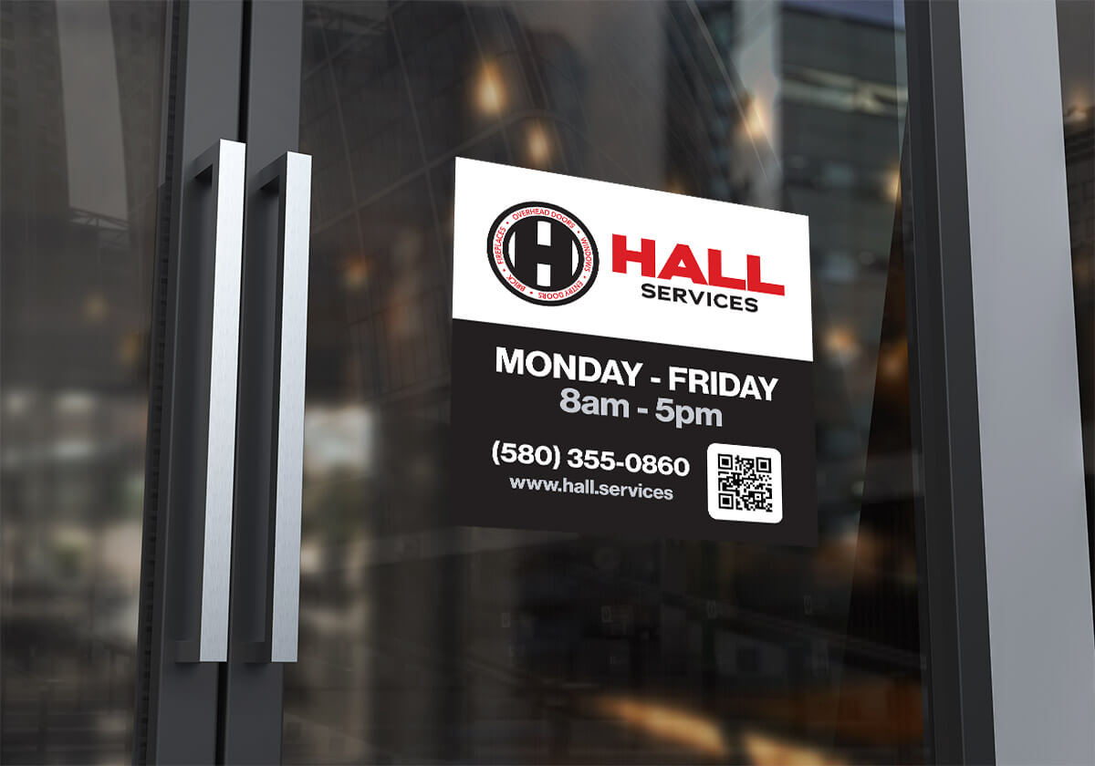 Black, red and white sticker on glass door with Hall logo, hours, phone number and R code.
