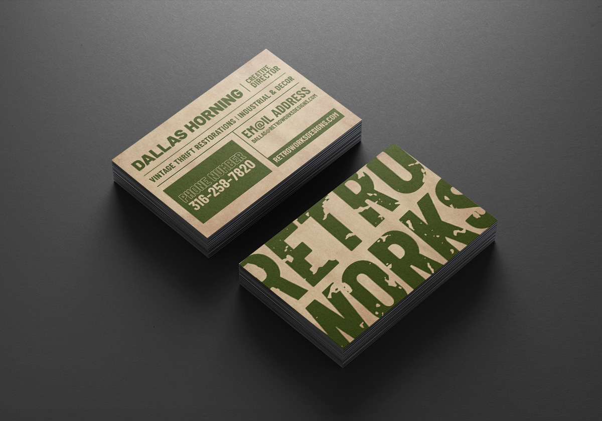 The front and back of the Retroworks business cards displayed in a stack on a dark background.