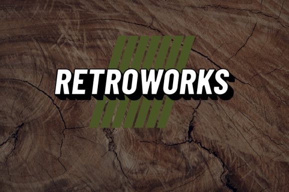 Retroworks logo design over wooden background.