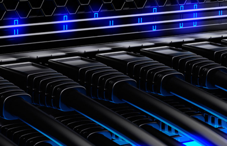 Close up of a server with black network cables and blue lights.