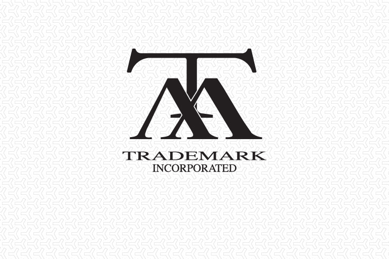 Trademark, Inc. logo over light patterned background.